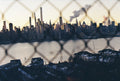 NYC Sunset Through the Fence